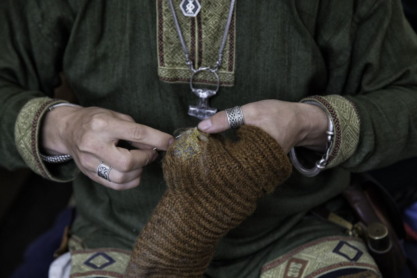 medieval actor working with yarn