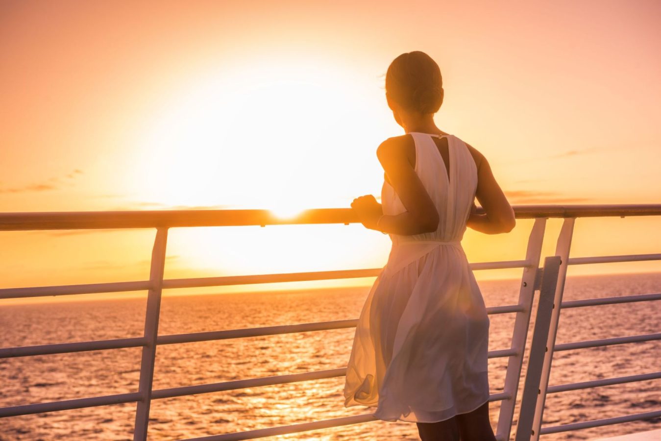 woman enjoying a sunset cruise in lido key florida